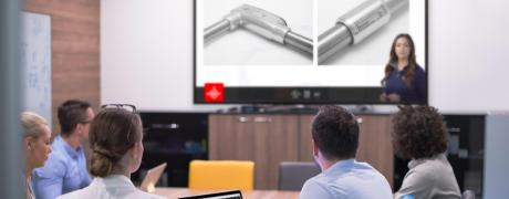 Room of people receiving Robroy Stainless training